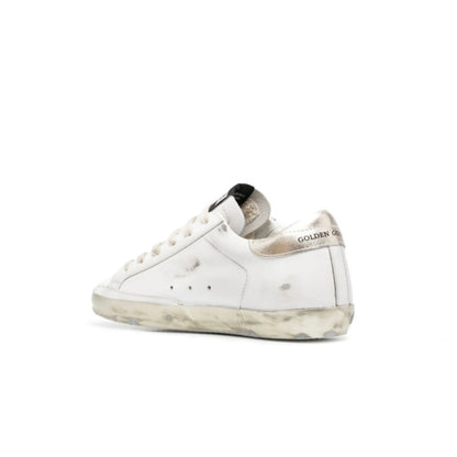 Golden Goose Women's Super-Star with gold sparkle foxing and metal stud lettering